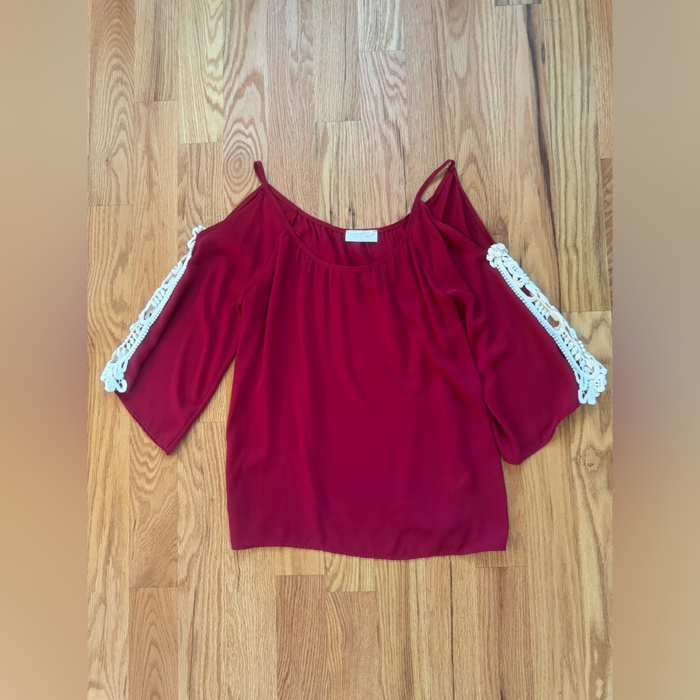Red off shoulder blouse with lace detail